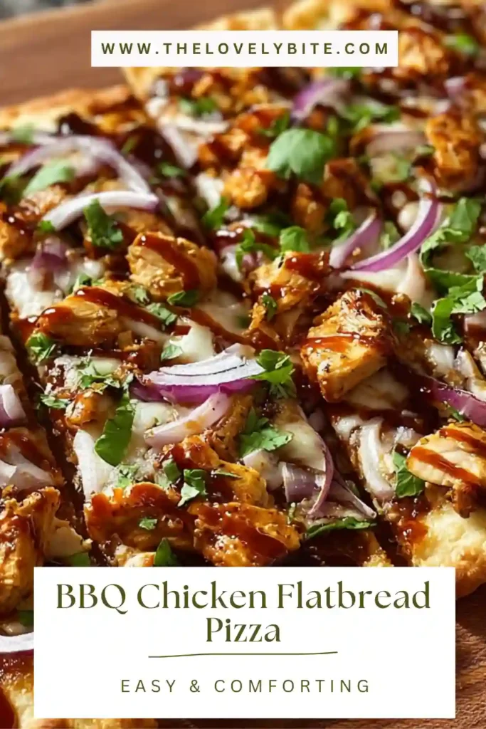 A close-up of BBQ Chicken Flatbread Pizza fresh from the oven with bubbling cheese and barbecue-coated chicken. The crisp edges and fresh cilantro make this homemade flatbread pizza look savory and satisfying.