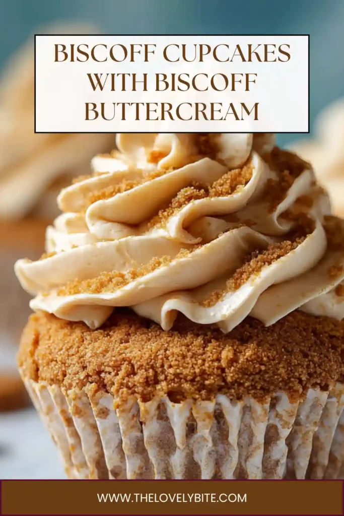 Homemade Biscoff cupcakes filled with cookie butter and decorated with Biscoff cookies. The frosting appears smooth and creamy.