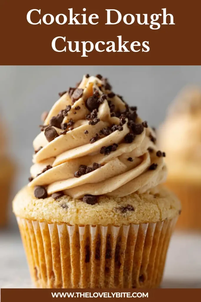 Close-up of Cookie Dough Cupcakes with creamy brown sugar buttercream piped high on top. The cupcakes are filled with edible cookie dough for a sweet and indulgent homemade dessert.
