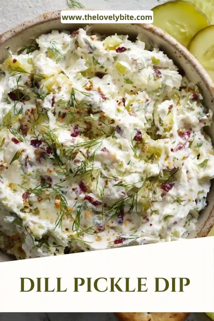 Close-up of dill pickle dip with visible pickle chunks and smooth cream cheese base, perfect for dipping snacks.
