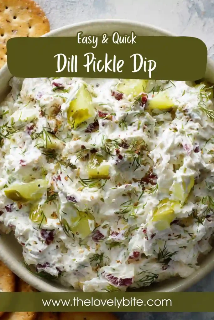 Homemade dill pickle dip garnished with pickles and served with assorted crackers and vegetables.