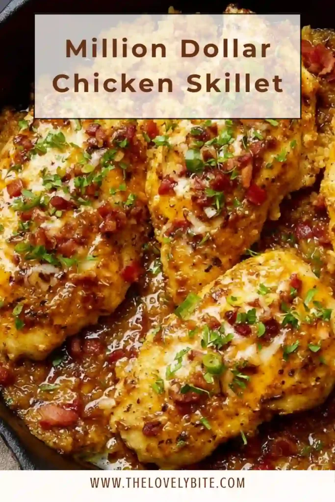 Close up of cheesy baked chicken skillet with crispy breadcrumb topping and creamy sauce