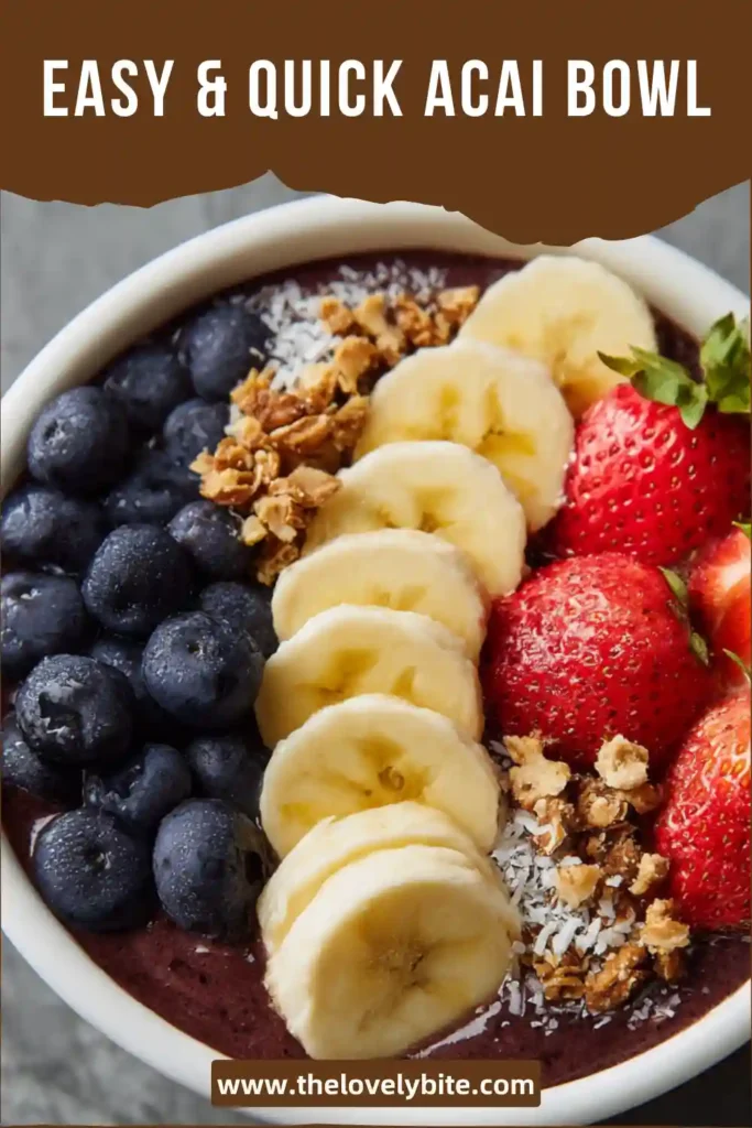 Healthy acai bowl with colorful fruit toppings including kiwi, banana, and berries arranged beautifully over a smooth purple base.