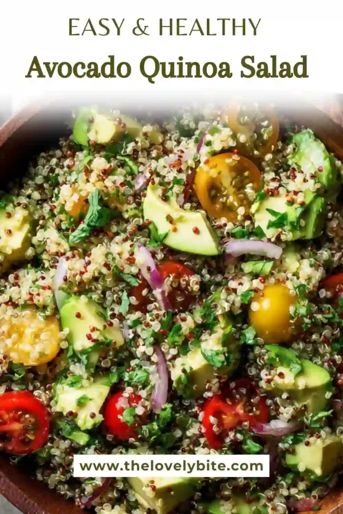 Clean eating avocado quinoa salad featuring tomatoes, cucumbers, and herbs mixed with quinoa.