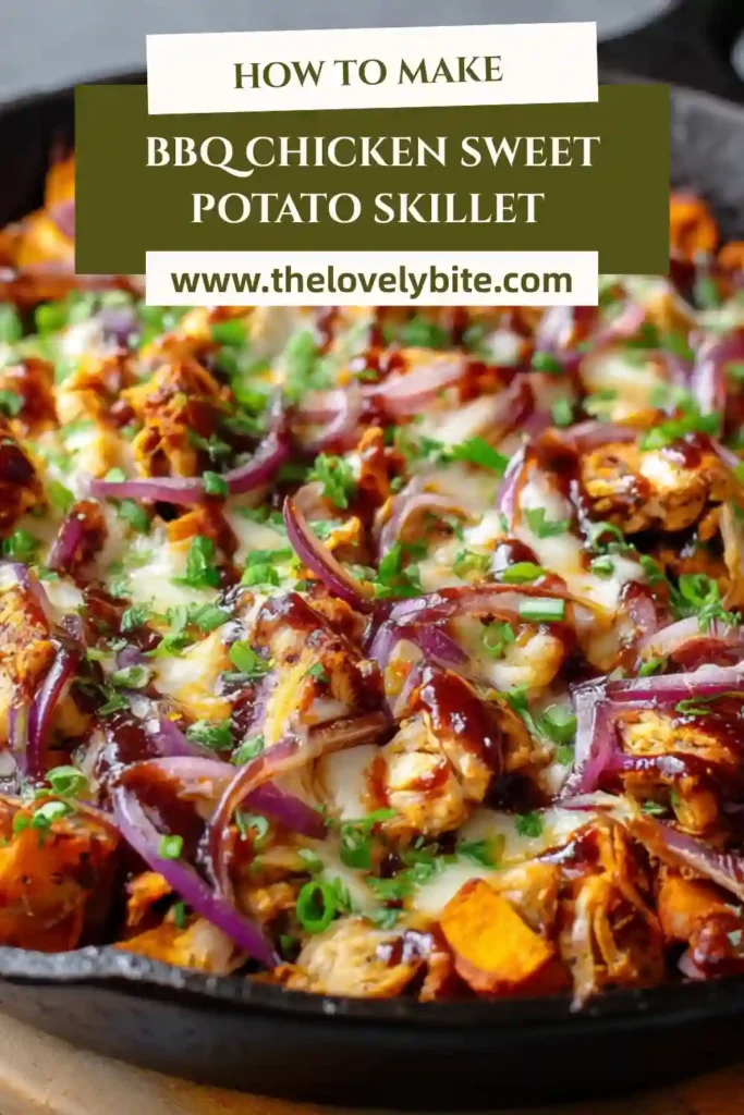 Overhead view of BBQ Chicken Sweet Potato Skillet with colorful vegetables and cheesy topping in a rustic skillet.