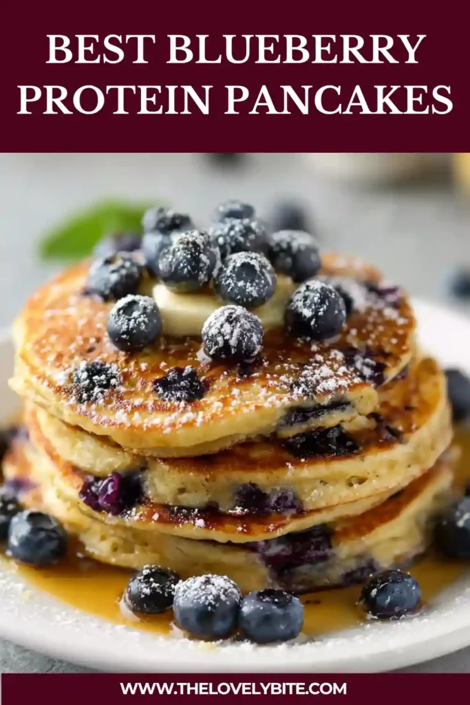 Close-up of fluffy blueberry protein pancakes made with almond flour and served warm with syrup and berries.
