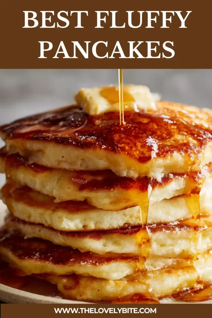 Best fluffy pancakes cooking on a pan with bubbles forming on top. The batter looks thick and creamy.