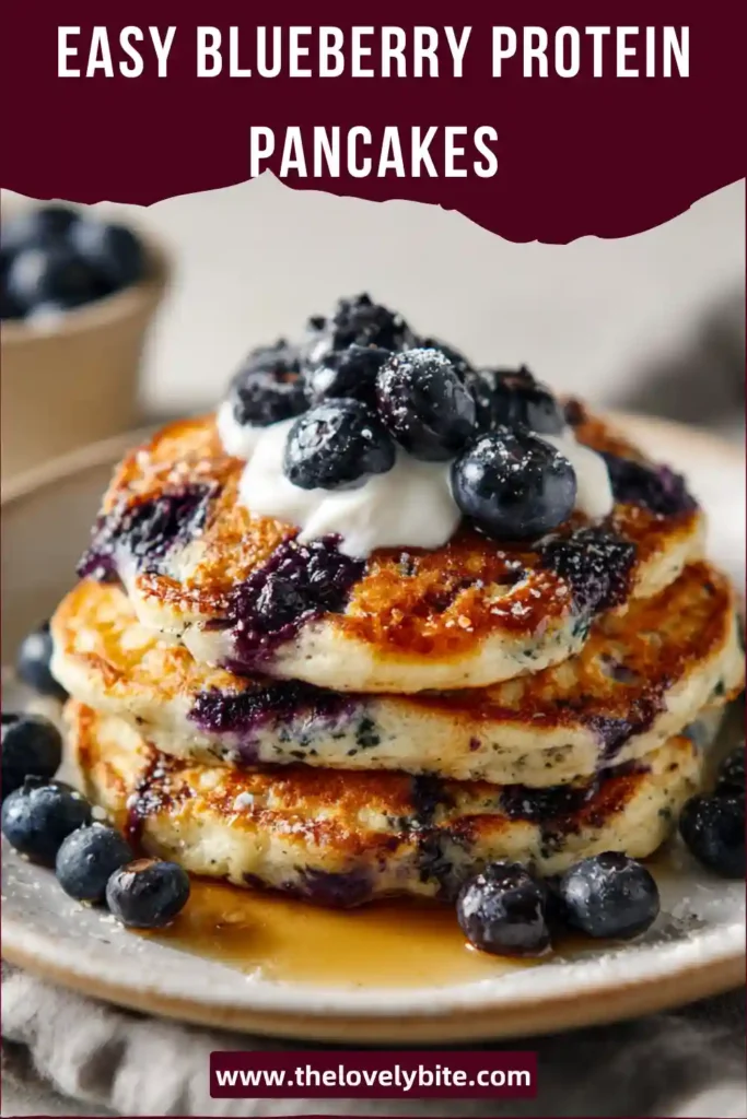 Homemade blueberry protein pancakes served warm with fresh fruit and natural toppings. Healthy and easy breakfast option.