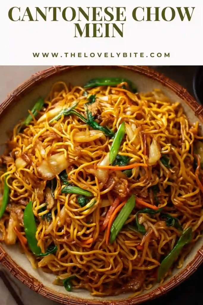 A plate of Cantonese Chow Mein recipe with crispy golden noodles, bean sprouts, and green onions tossed in savory sauce.