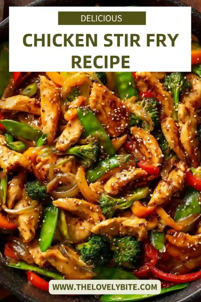 Homemade chicken stir fry recipe in a skillet with bright vegetables and rich sauce evenly coating the ingredients.