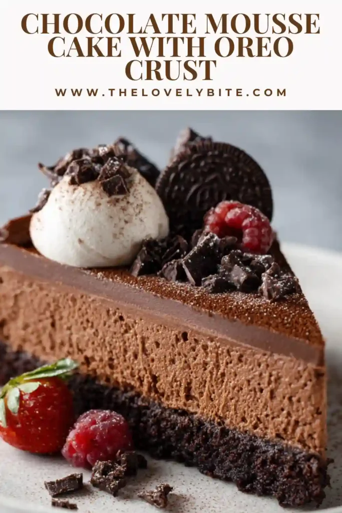 A full Chocolate Mousse Cake in a springform pan decorated with whipped cream swirls, cookie halves, and chocolate curls. The cake has a beautiful layered look and a rich chocolate finish ideal for dessert tables.