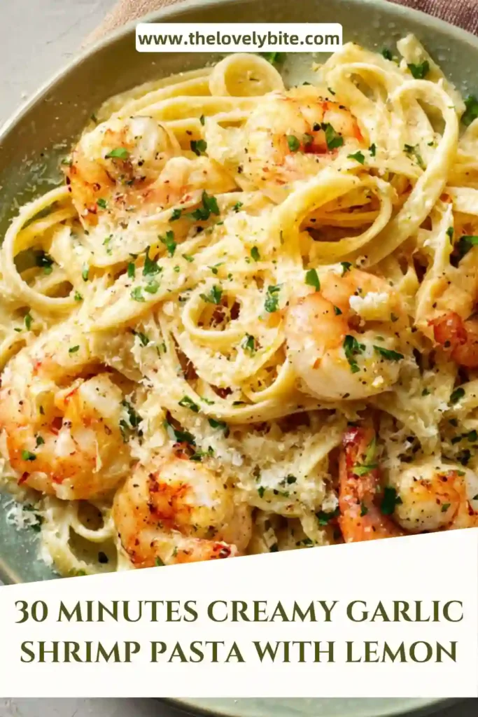 Freshly made creamy garlic shrimp pasta served warm with herbs and citrus zest, highlighting a glossy, rich sauce.