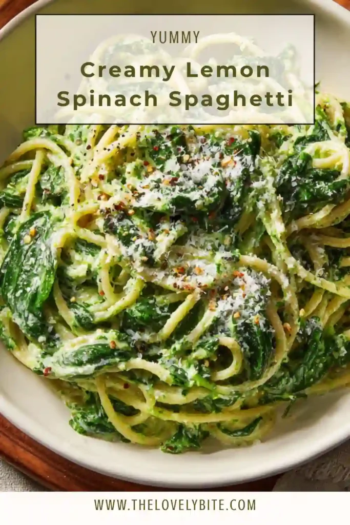 Healthy whole wheat spaghetti with creamy spinach lemon sauce garnished with walnuts and parmesan.