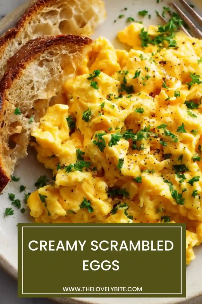Fluffy scrambled eggs cooked gently with butter, served warm on crispy toast slices.
