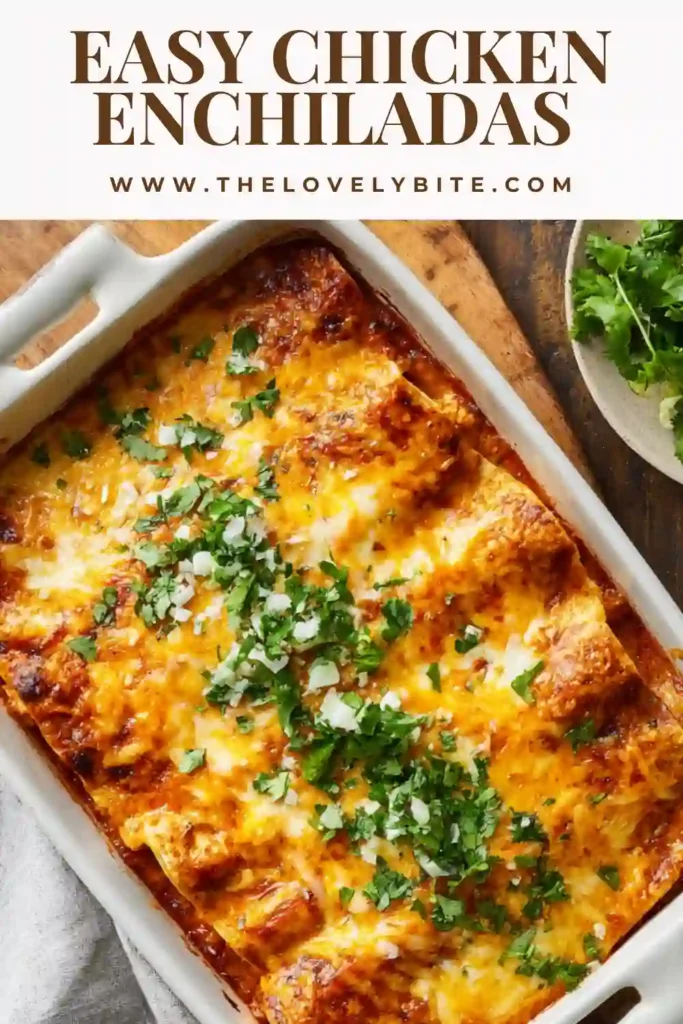 Close-up of cheesy easy chicken enchiladas garnished with cilantro and sour cream, showing melted texture and golden edges.