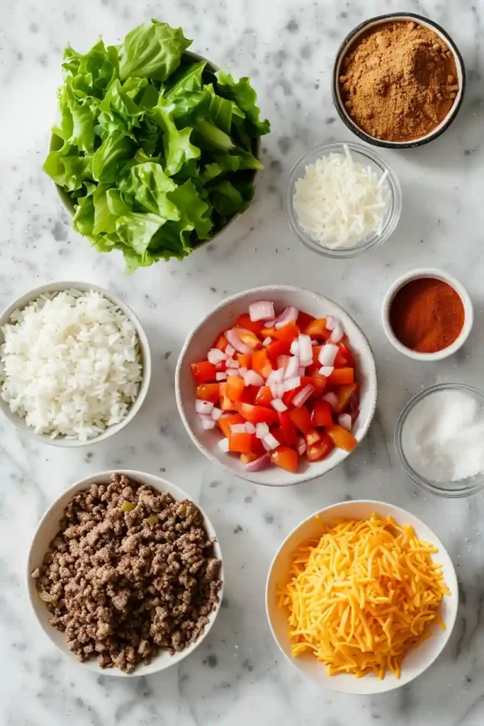Close-up of easy taco skillet recipe with seasoned beef, rice, and fresh garnish.
