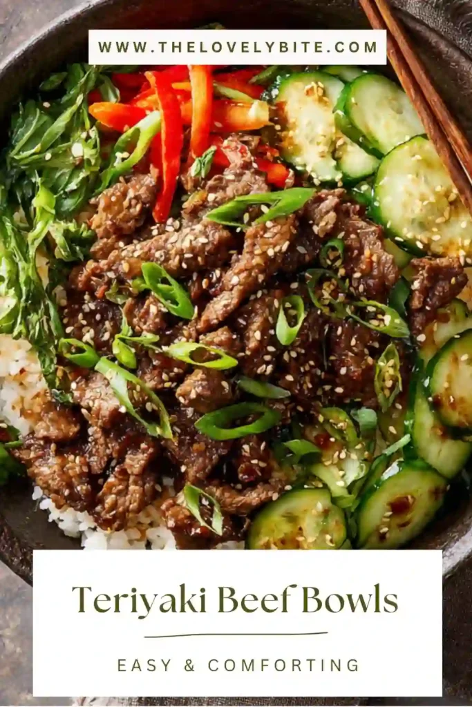 A bowl of easy teriyaki beef bowls with rice, broccoli, and sesame seeds, showcasing glossy sauce and fresh vegetables.