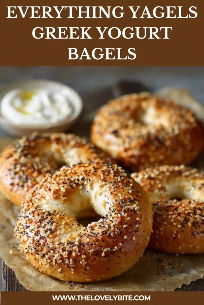 Freshly baked Greek Yogurt Bagels topped with everything seasoning, golden brown and served warm on a tray.