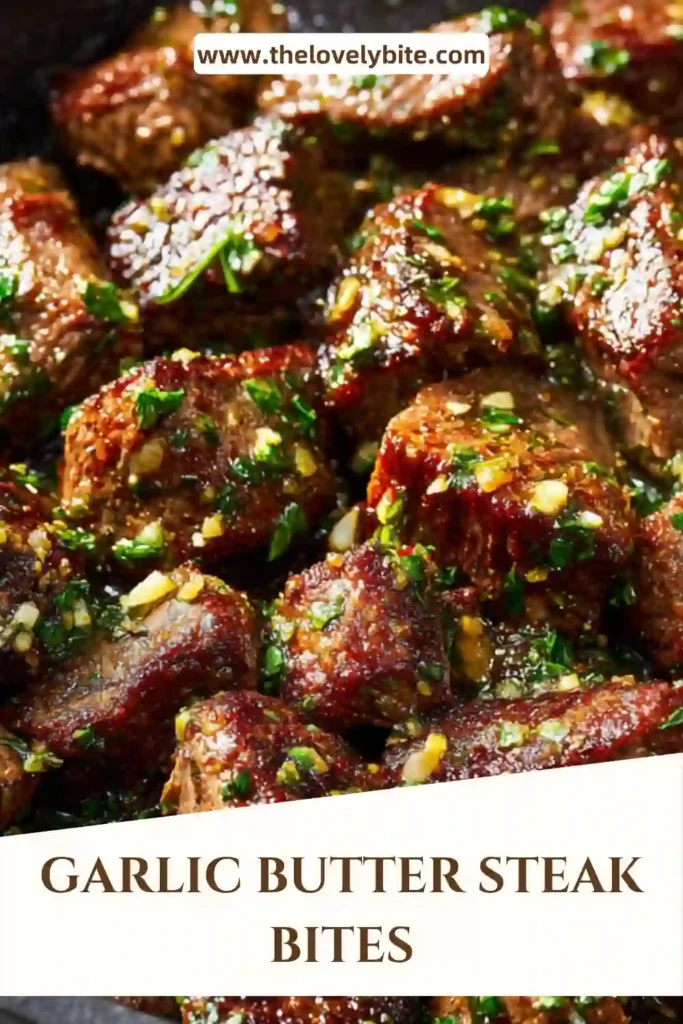 Tender steak bites in garlic butter sauce served hot with chopped parsley and seasoning.