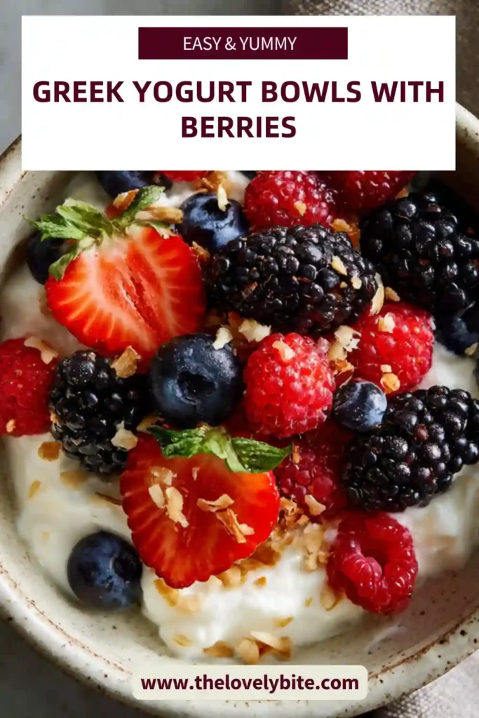 Close-up of a healthy yogurt bowl with mixed berries, honey drizzle, and granola. This Greek Yogurt Bowls with Berries recipe looks fresh and nutritious.