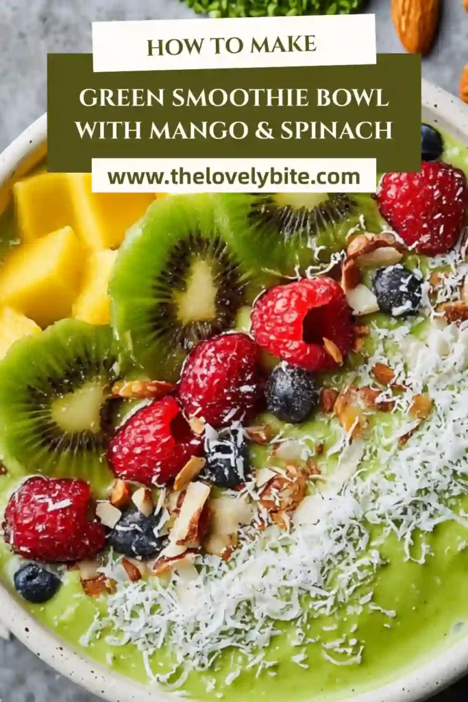 A homemade green smoothie bowl with banana, mango, and spinach, topped with strawberries and coconut flakes. Smooth, thick, and visually appealing.
