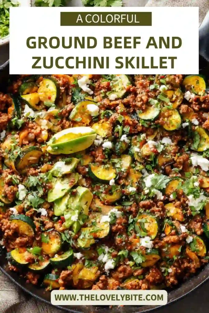 A close view of Ground Beef and Zucchini Skillet topped with melted cheese, cilantro, and green onions. The one pan meal is packed with vegetables and bold taco-style flavor.