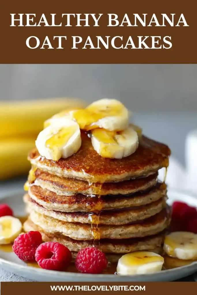 Plate of healthy banana oat pancakes served with berries and syrup. A nutritious flourless breakfast option.