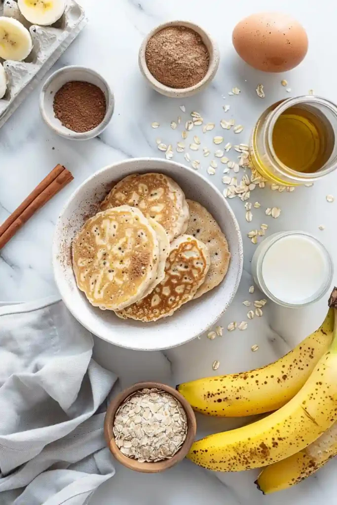 Homemade Healthy Banana Oatmeal Pancakes stacked and drizzled with syrup, showcasing a wholesome breakfast.