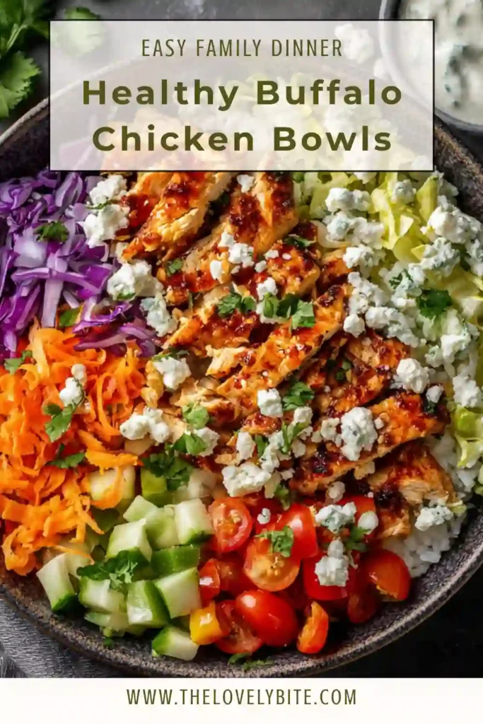 Healthy Buffalo Chicken Bowls featuring buffalo chicken, cucumbers, tomatoes, carrots, and rice in a colorful presentation.