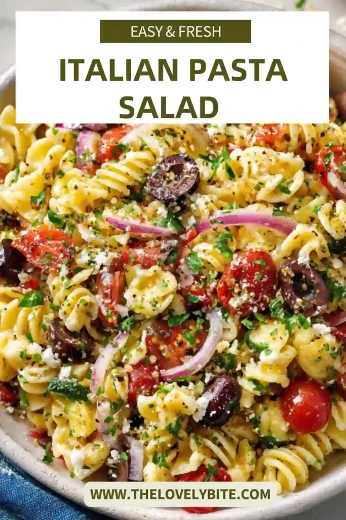 Fresh Italian pasta salad served in a bowl with vibrant vegetables, herbs, and tender chicken pieces for a healthy dish.