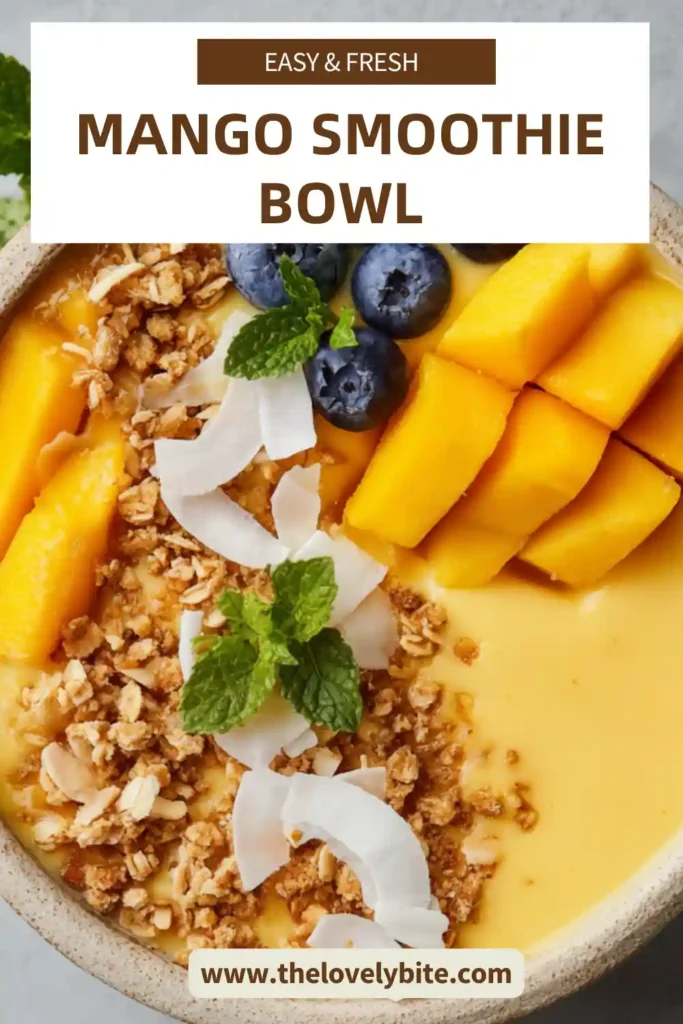 This Fresh Mango Smoothie Bowl features a smooth golden mango and pineapple blend with colorful fruit toppings. Bananas, berries, and coconut add texture and make this healthy smoothie bowl look vibrant and inviting.