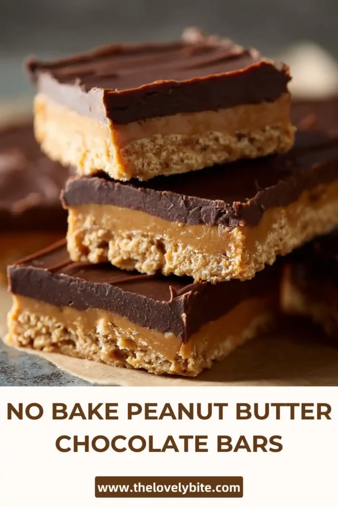 Sliced peanut butter chocolate bars arranged on a tray highlighting layered no bake dessert bars.