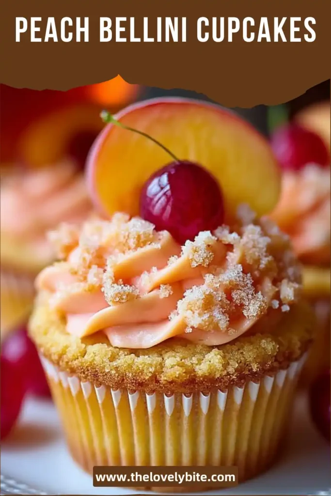 Soft peach cupcakes with creamy frosting and sparkling sugar, showcasing a light and fluffy texture.