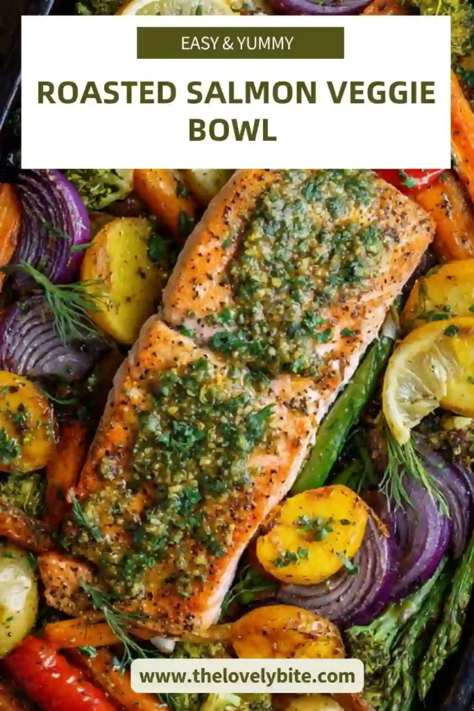 Close-up of roasted salmon veggie bowl sheet pan dinner featuring sweet potatoes, zucchini, and pesto topping.