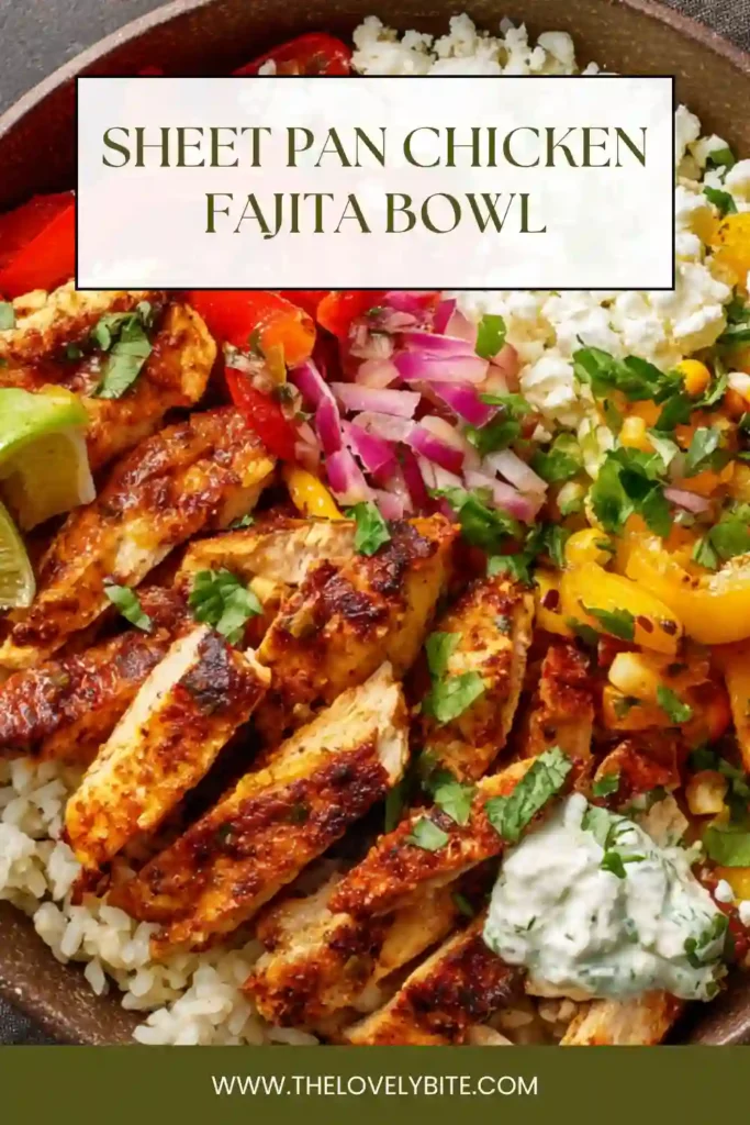 Close-up of a Sheet Pan Chicken Fajita Bowl topped with avocado, tomatoes, and herbs over rice.