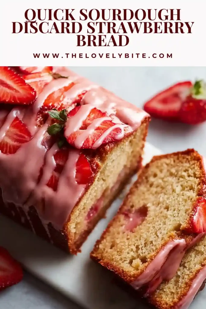 Close-up of sourdough discard strawberry bread slices with soft texture and vibrant strawberry pieces. Finished with a smooth strawberry glaze drizzle.