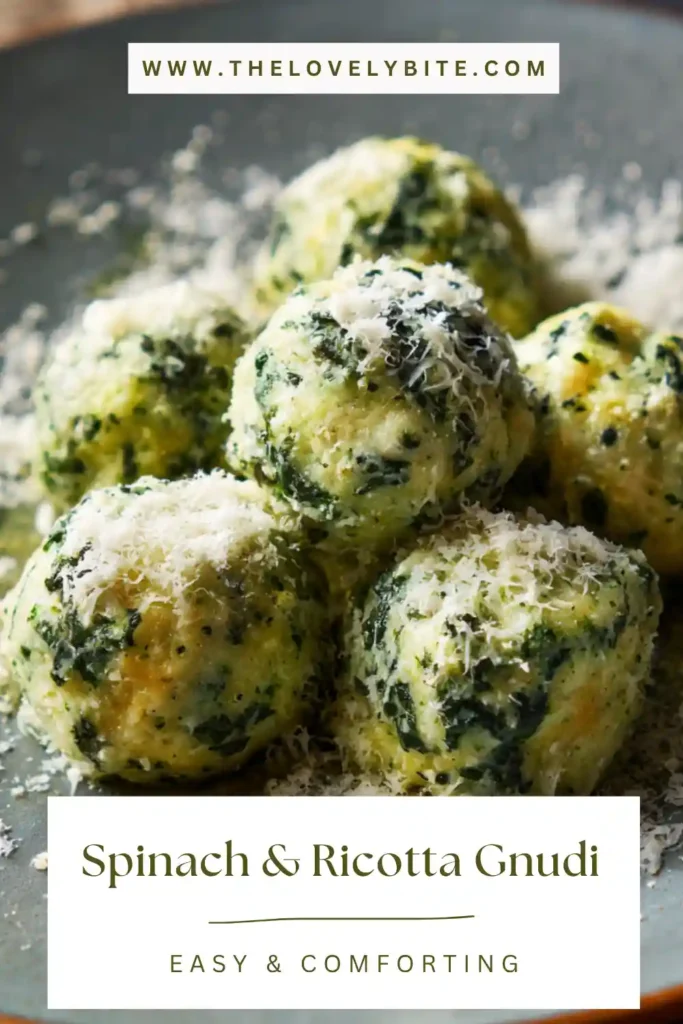 Spinach & Ricotta Gnudi served in a creamy butter sauce with visible chili flakes. The dumplings appear soft and tender with a glossy finish.