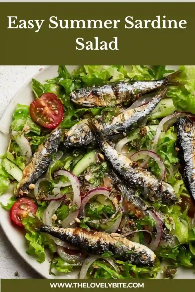 A vibrant Summer Sardine Salad with cucumber, red onion, parsley, and sardines arranged over fresh greens. The lemon mustard dressing gives this Mediterranean sardine salad a fresh and tangy flavor.