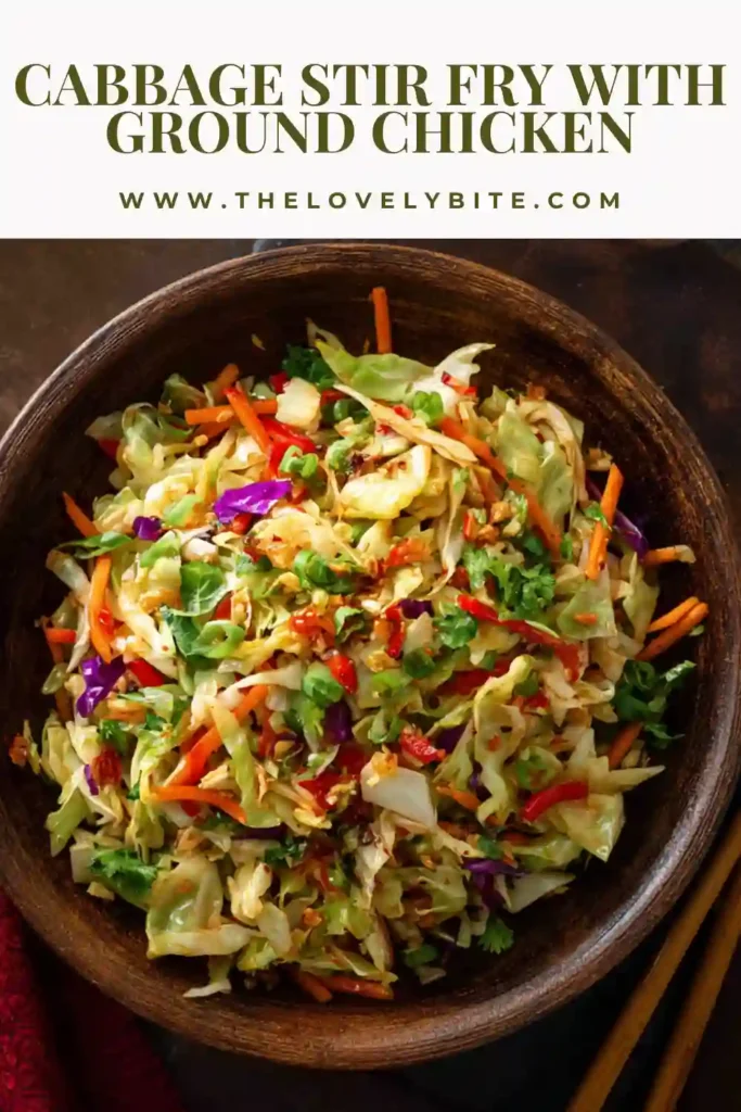 A bowl of cabbage stir fry with ground chicken, carrots, and green onions, cooked to crisp-tender perfection with a glossy savory sauce.