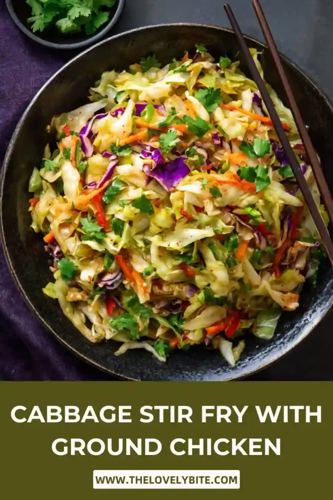 Close-up of healthy cabbage stir fry featuring shredded cabbage, minced chicken, and fresh herbs in a skillet.