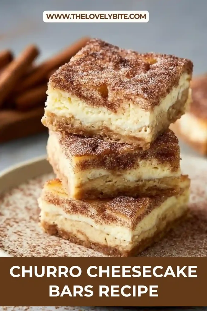 Freshly baked Churro Cheesecake Bars cooling in a baking pan with crisp golden layers and smooth cheesecake center. A simple cinnamon dessert recipe made with crescent roll dough.