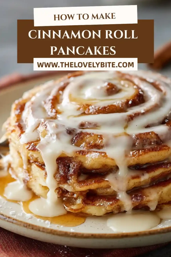 Homemade Cinnamon Roll Pancakes served warm with rich cream cheese frosting drizzled on top. The cinnamon sugar swirl creates a bakery-style breakfast treat.