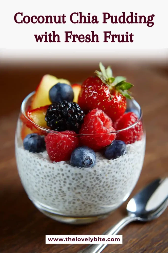 A creamy Coconut Chia Pudding topped with fresh strawberries, blueberries, and blackberries in a glass jar. This vegan and gluten free chia pudding looks rich, refreshing, and perfect for breakfast.