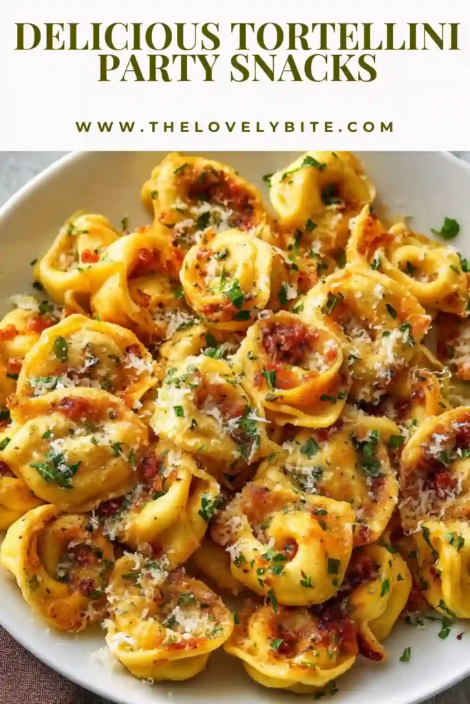 Close-up of crispy baked tortellini appetizers topped with Parmesan cheese and fresh parsley. These easy tortellini party snacks are perfect for gatherings and game nights.