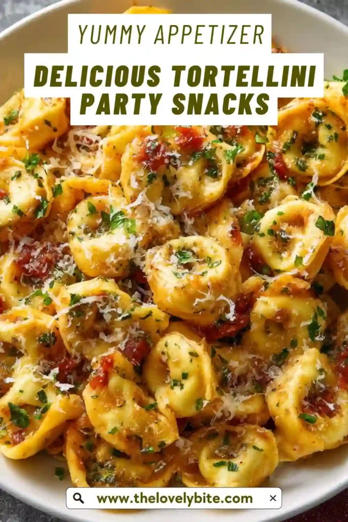 Freshly baked tortellini bites arranged on a serving tray with warm marinara sauce. The golden crispy exterior makes these tortellini snacks irresistible.
