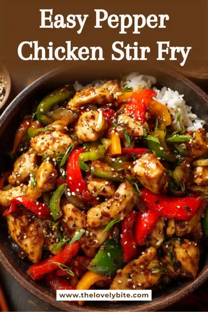 Close-up of Pepper Chicken Stir Fry served over steamed rice with crisp vegetables and savory sauce. This easy stir fry recipe is ideal for busy weeknight meals.