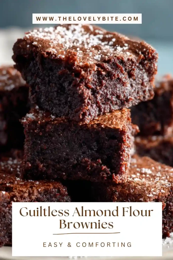 Healthy almond flour brownies cooling in an 8x8 baking dish after baking. The brownies have a dense fudgy texture perfect for chocolate lovers.