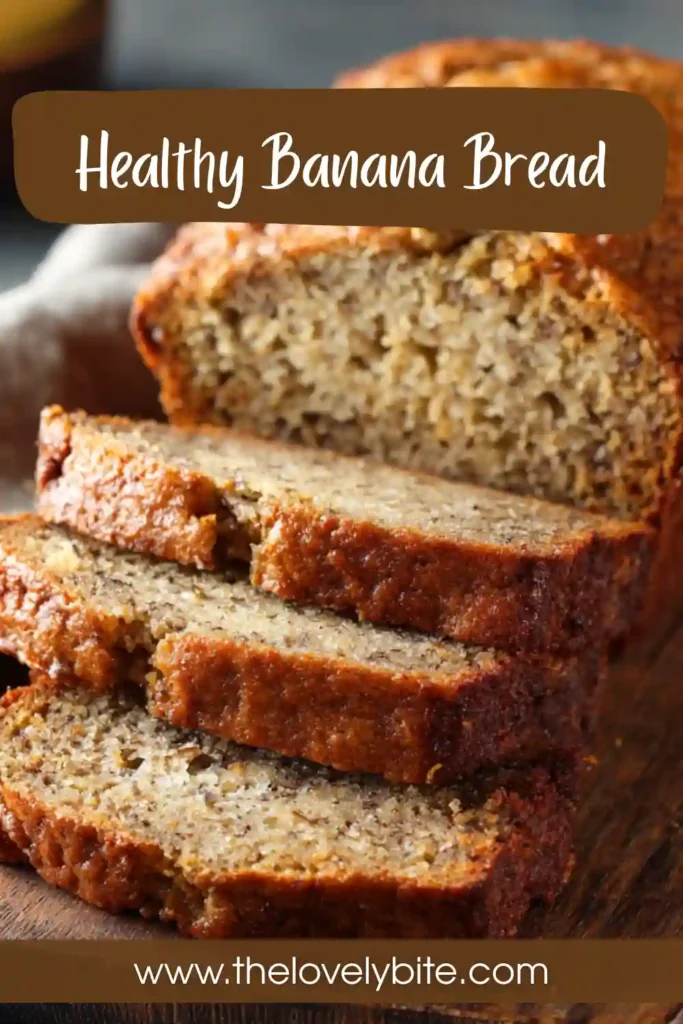 Freshly baked healthy banana bread cooling on a wire rack with visible banana texture inside. The soft crumb and cinnamon aroma make this homemade loaf perfect for breakfast or snacks.