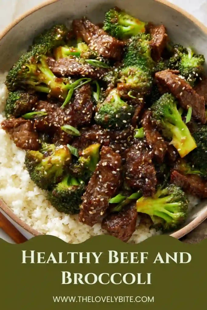 Freshly cooked Healthy Beef and Broccoli in a skillet with steam rising, showcasing glossy sauce and crisp vegetables.