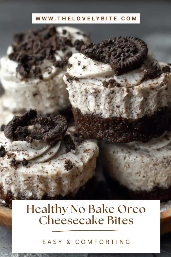 Close-up of Healthy No Bake Oreo Cheesecake Bites topped with crushed cookies. This easy frozen dessert has a rich cheesecake texture with a lightened-up twist.